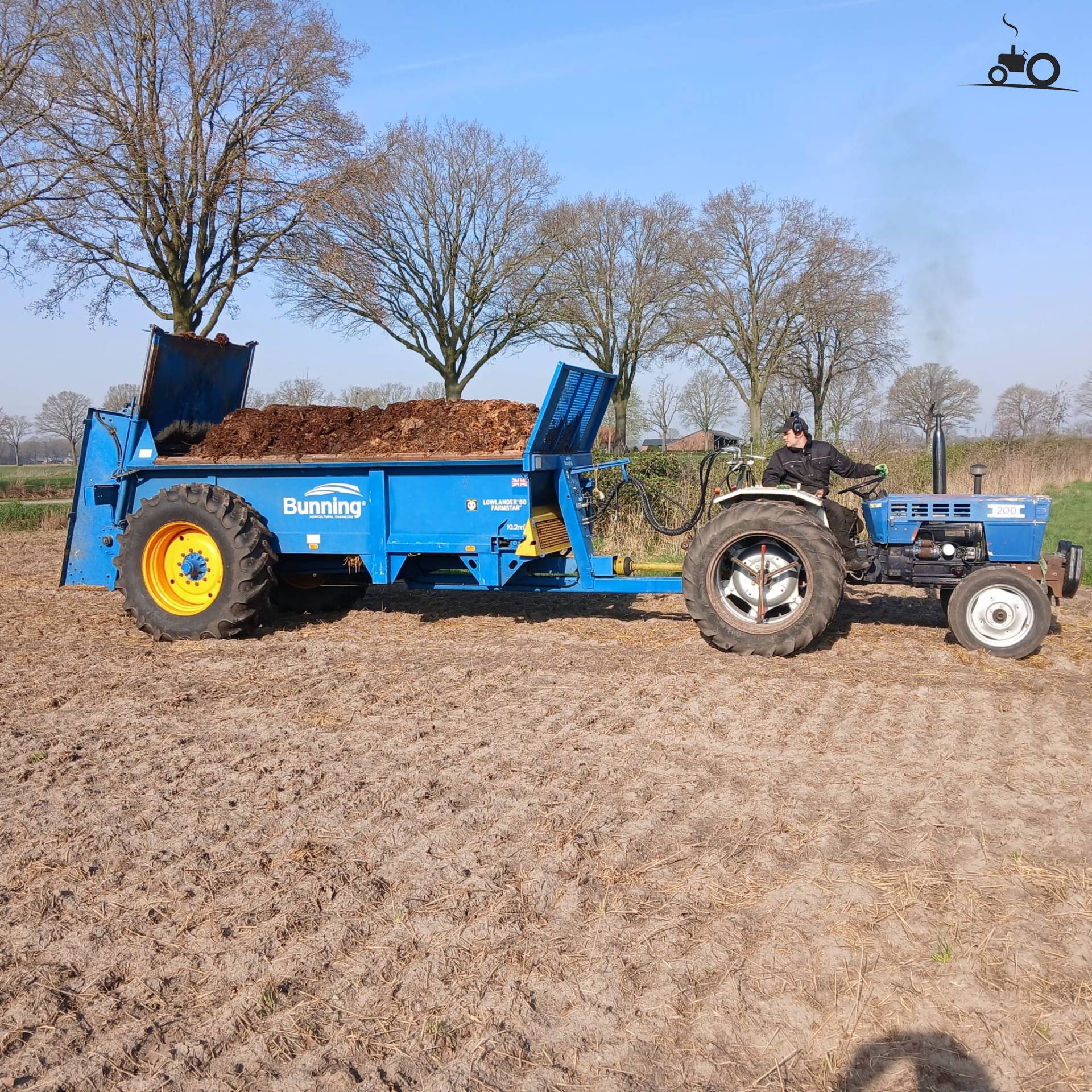 Lamborghini R503 with a manure spreader