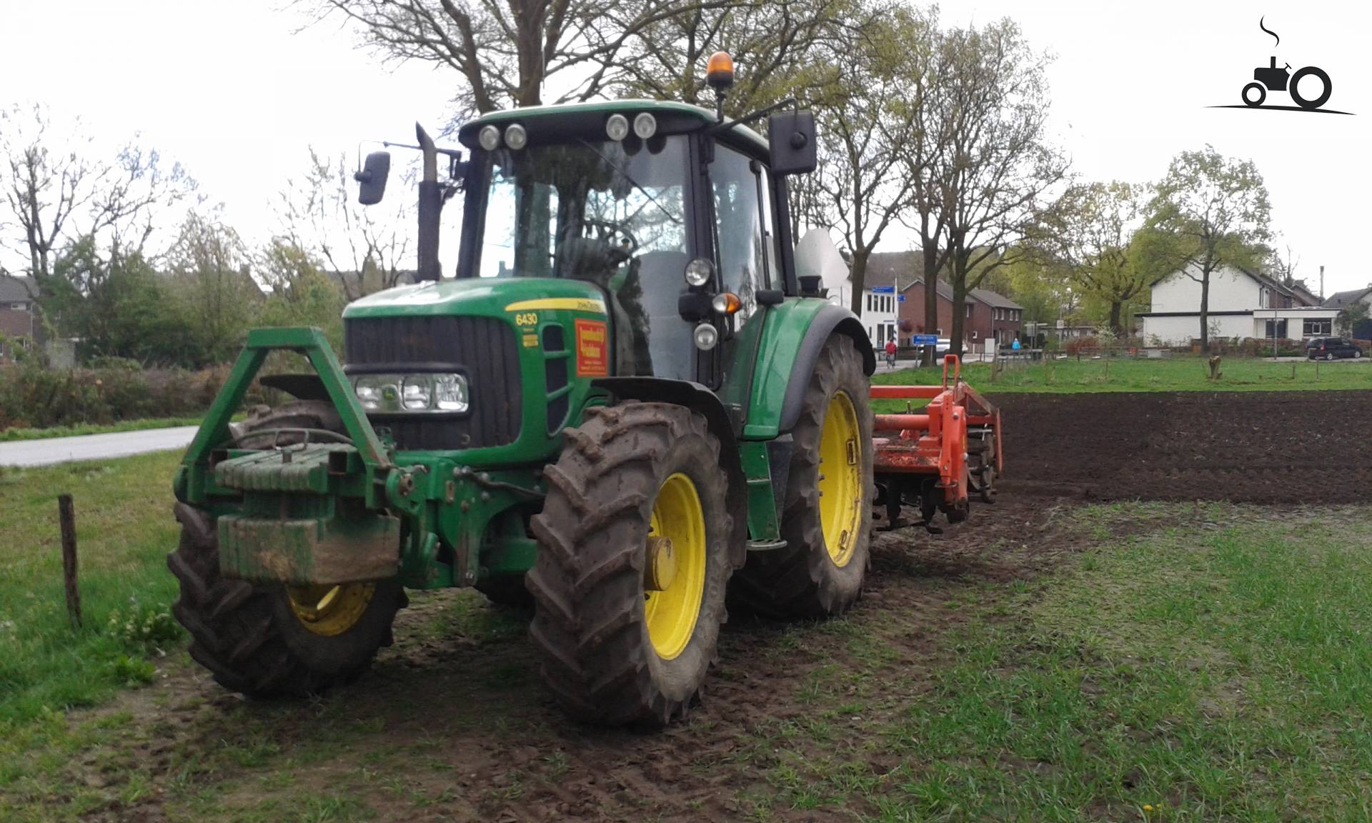 Foto John Deere 6430 Premium Van Loonbedrijf Heldens 9979