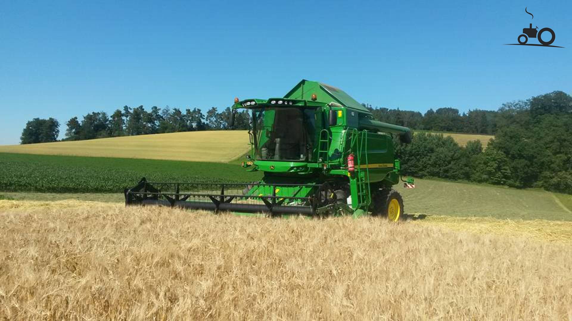 Foto John Deere T 550 #921952