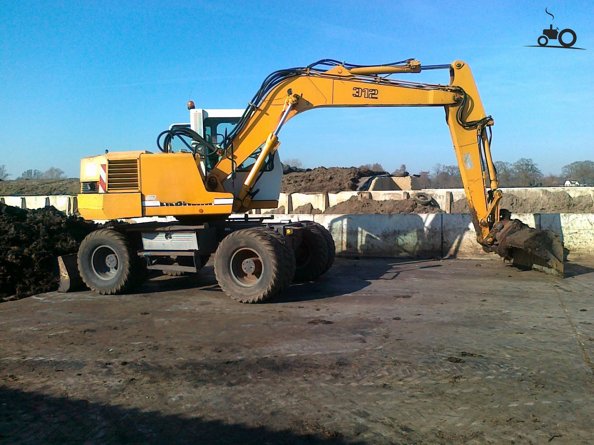 Foto Liebherr 312 #736163