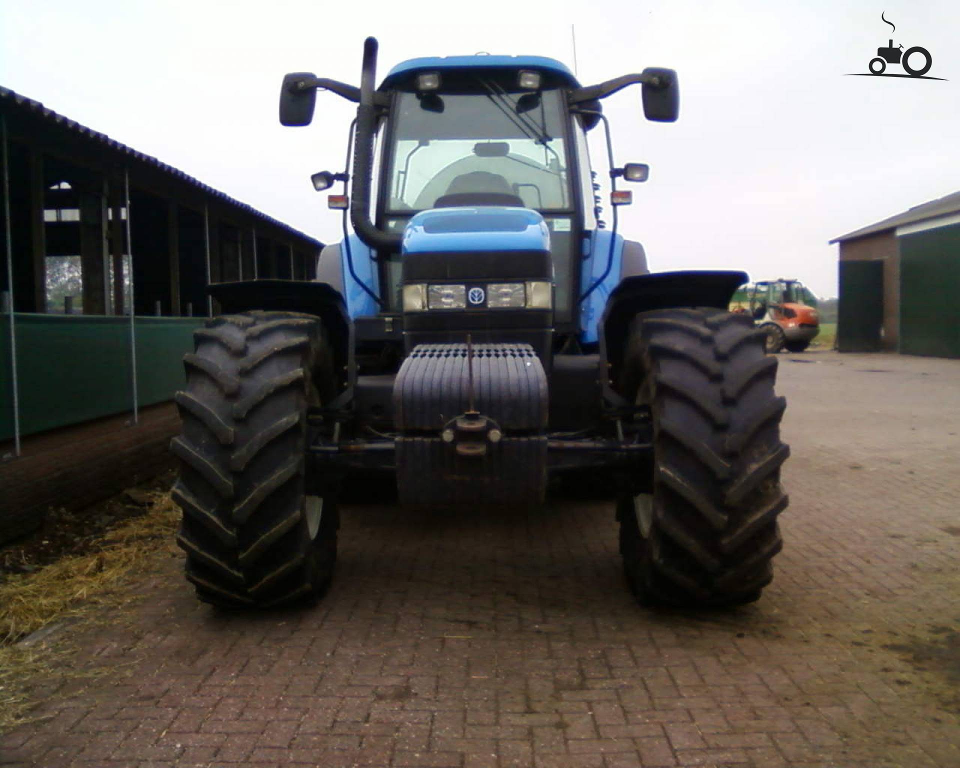 Foto New Holland TM 155 #499152