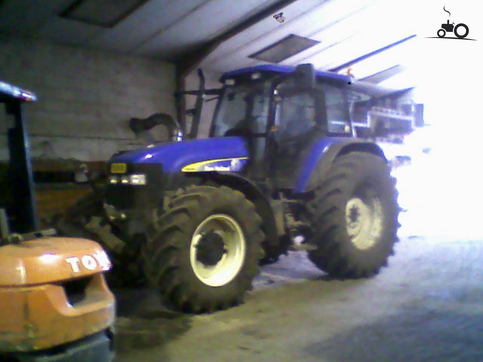 Foto New Holland TM 155 #542395